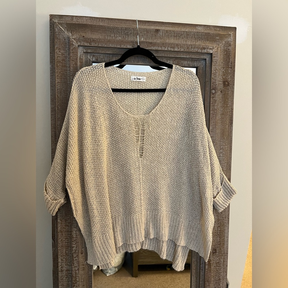 In loom beige knit sweater. Size XS/S. 3/4 sleeves with cuffs.